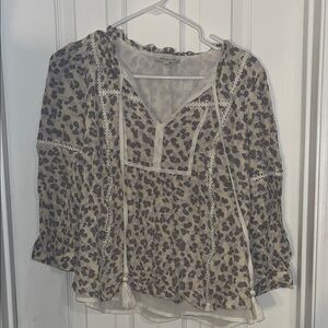 Chic Leopard Print Blouse with Tassel Details